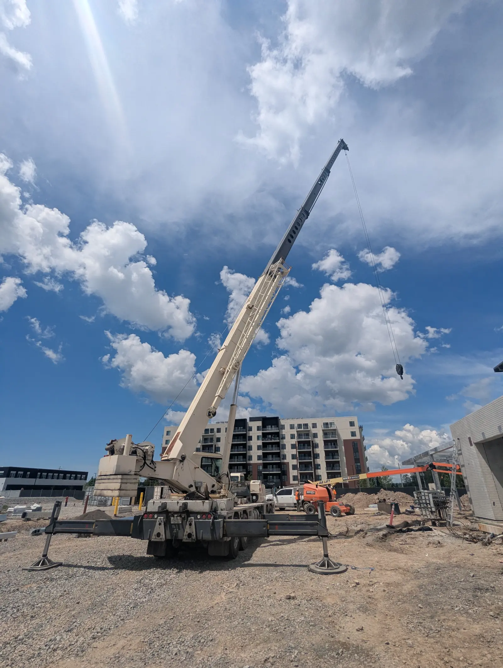 Crane working at a commercial job site